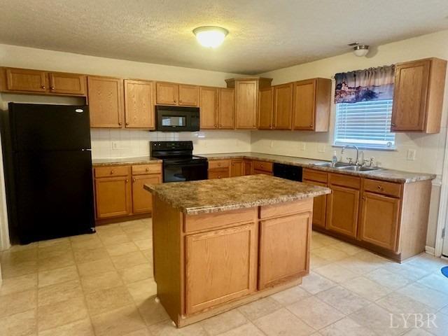 1095 Middle View Drive Forest, VA 24551 - Photo 4 of 25 a kitchen with stainless steel appliances granite countertop a stove a sink and a refrigerator