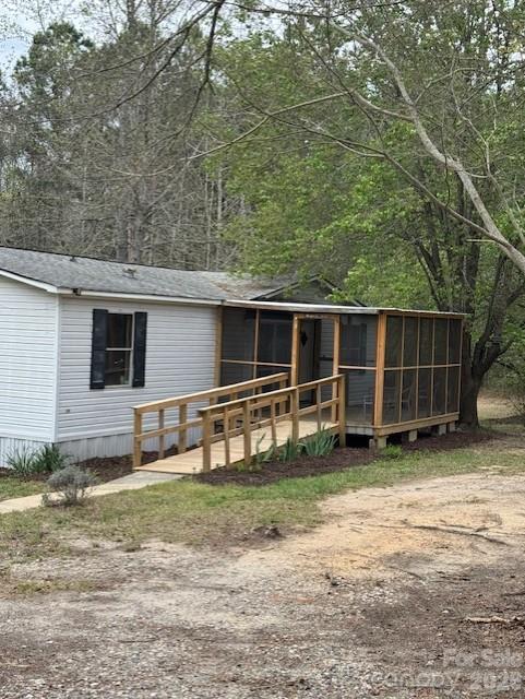 1216 Raxter Road Edgemoor, SC 29712 - Photo 1 of 20 a view of a house with a yard and wooden fence