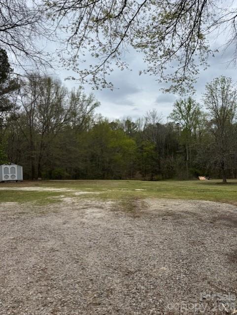 1216 Raxter Road Edgemoor, SC 29712 - Photo 16 of 20 a view of a field with trees