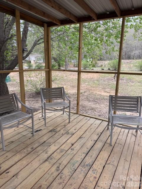1216 Raxter Road Edgemoor, SC 29712 - Photo 5 of 20 a view of living room with floor to ceiling windows and wooden floor
