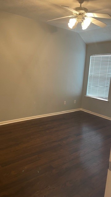 6719 Emerald Shire Lane Houston, TX 77041 - Photo 21 of 37 a view of an empty room with wooden floor and a window