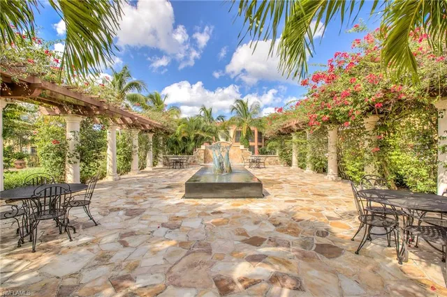 a view of a backyard with a patio