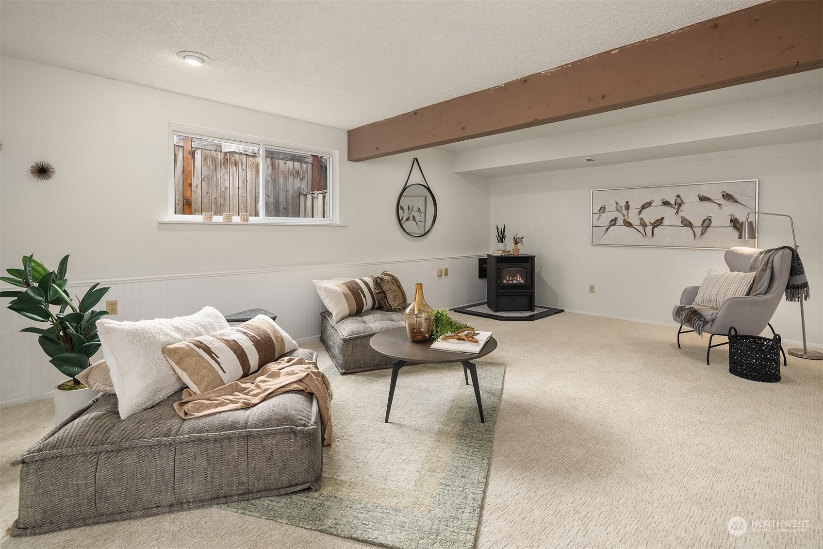 11002 Southeast 183rd Place Renton, WA 98055 - Photo 22 of 32 a living room with furniture and a clock