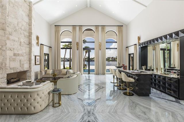 a view of a dining room with furniture and window
