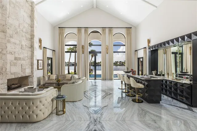 a view of a dining room with furniture and window