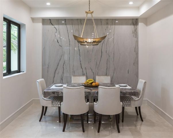 a living room with furniture and window