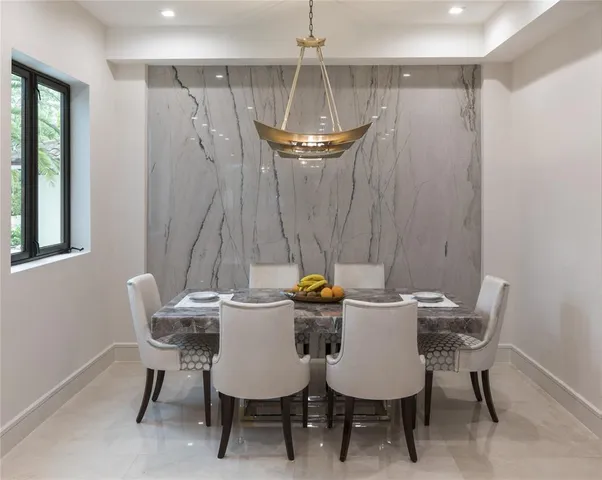 a living room with furniture and window