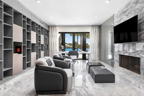 a large kitchen with a large counter top appliances and furniture