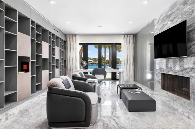 a large kitchen with a large counter top appliances and furniture