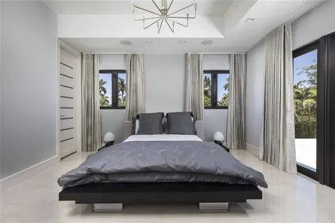 a bathroom with a bathtub a sink and a shower