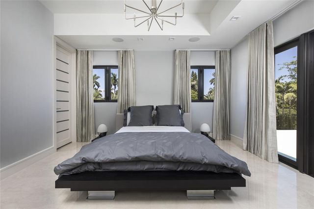 a bathroom with a bathtub a sink and a shower