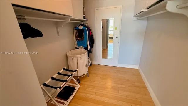 a bathroom with a granite countertop toilet a sink and bathtub
