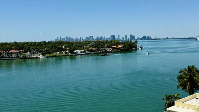 a view of a lake with a big yard