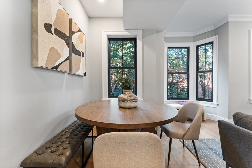 210 West Springfield Street, Unit 2 Boston, MA 02118 - Photo 14 of 33 a view of a dining room with furniture and window