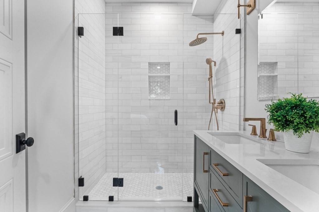 210 West Springfield Street, Unit 2 Boston, MA 02118 - Photo 20 of 33 a bathroom with a shower sink and mirror