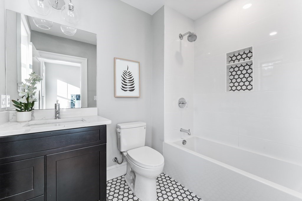 210 West Springfield Street, Unit 2 Boston, MA 02118 - Photo 29 of 33 a bathroom with a toilet a sink and a bathtub