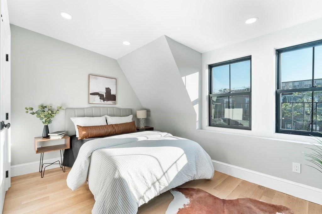 210 West Springfield Street, Unit 2 Boston, MA 02118 - Photo 30 of 33 a bedroom with bed and a window