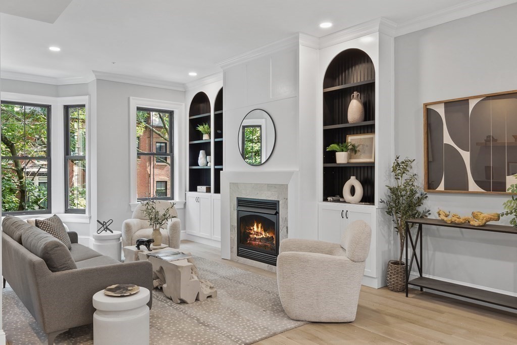 210 West Springfield Street, Unit 2 Boston, MA 02118 - Photo 3 of 33 a living room with furniture and a fireplace