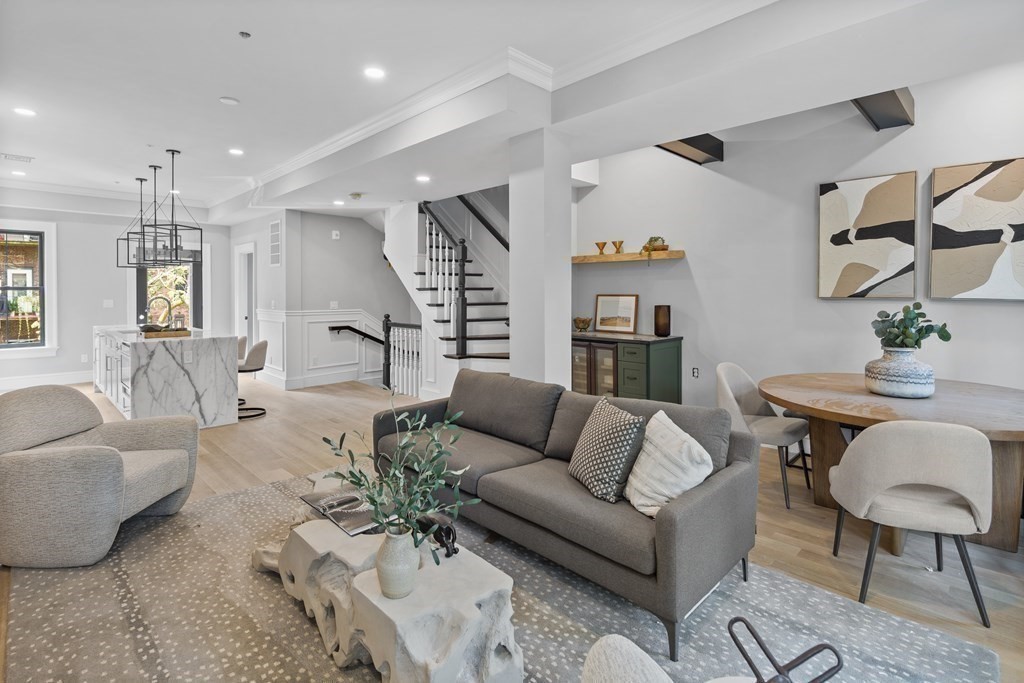 210 West Springfield Street, Unit 2 Boston, MA 02118 - Photo 5 of 33 a living room with furniture and wooden floor