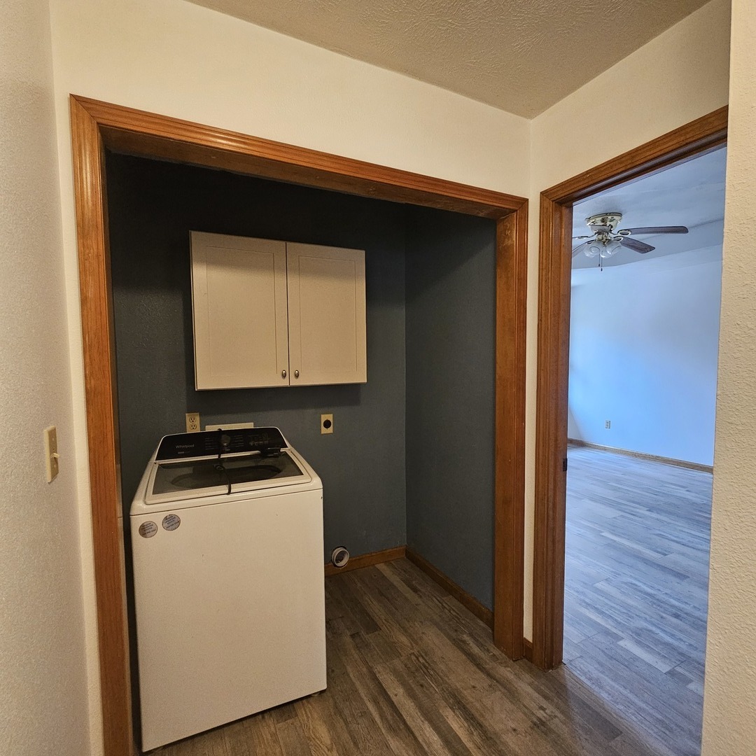 11211 Sam Pyle Bridge Road Benton, IL 62812 - Photo 11 of 11 a utility room with wooden floor washer and dryer