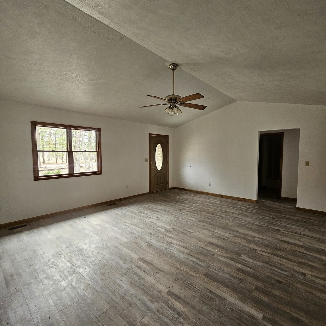 11211 Sam Pyle Bridge Road Benton, IL 62812 - Photo 2 of 11 a view of an empty room with a window