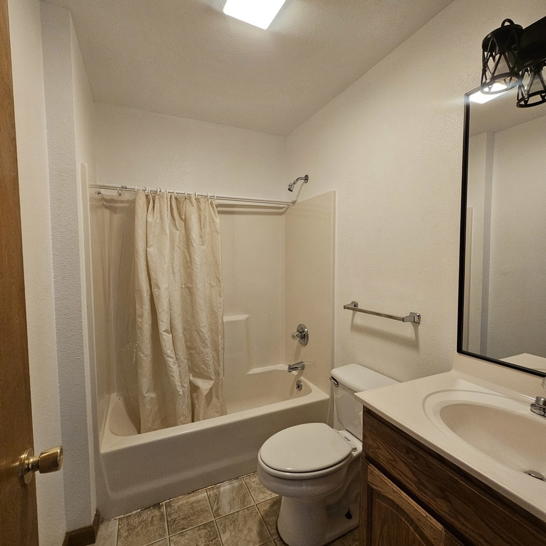 11211 Sam Pyle Bridge Road Benton, IL 62812 - Photo 9 of 11 a bathroom with a sink and a mirror