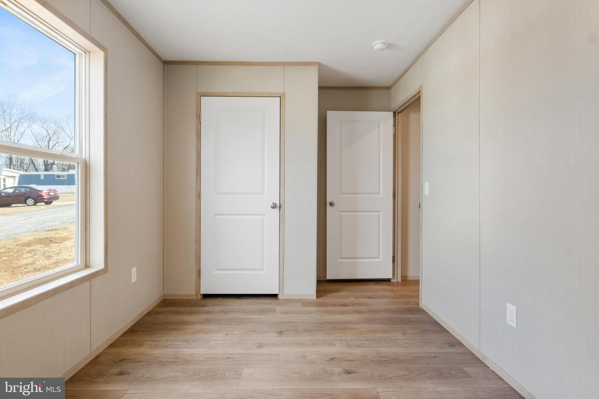9 Mill Street York, PA 17406 - Photo 12 of 32 an empty room with wooden floor and windows