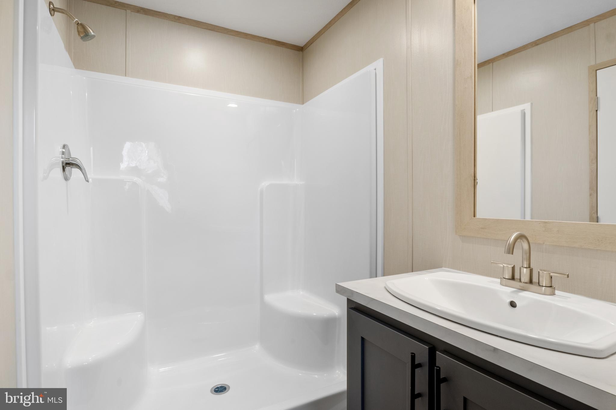 9 Mill Street York, PA 17406 - Photo 19 of 32 a bathroom with a sink a toilet and shower