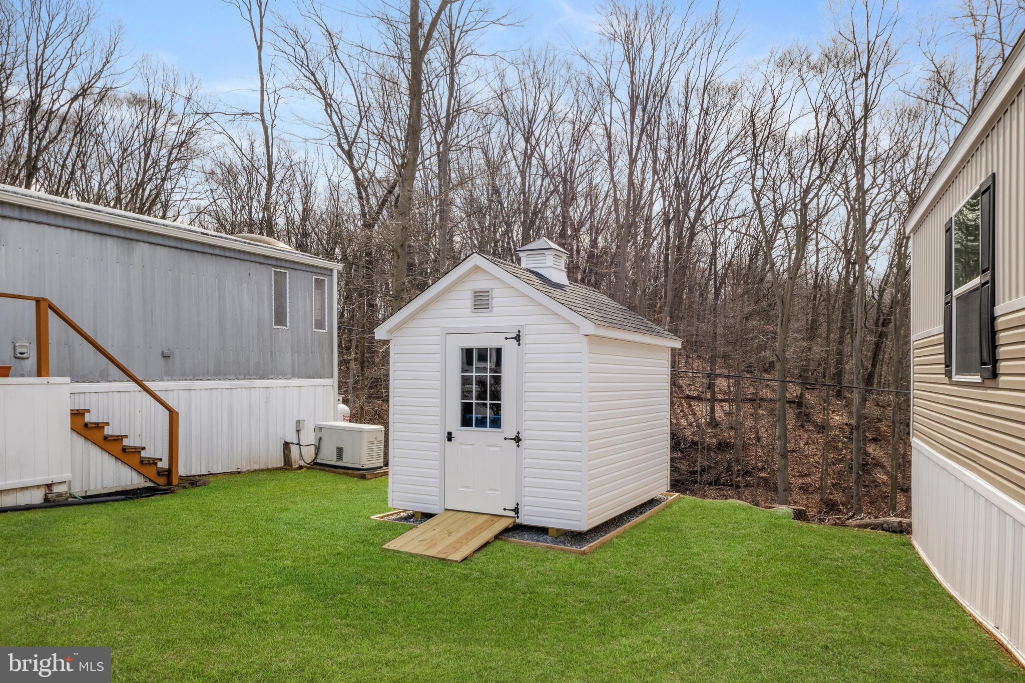 9 Mill Street York, PA 17406 - Photo 20 of 32 a view of a white house with a yard