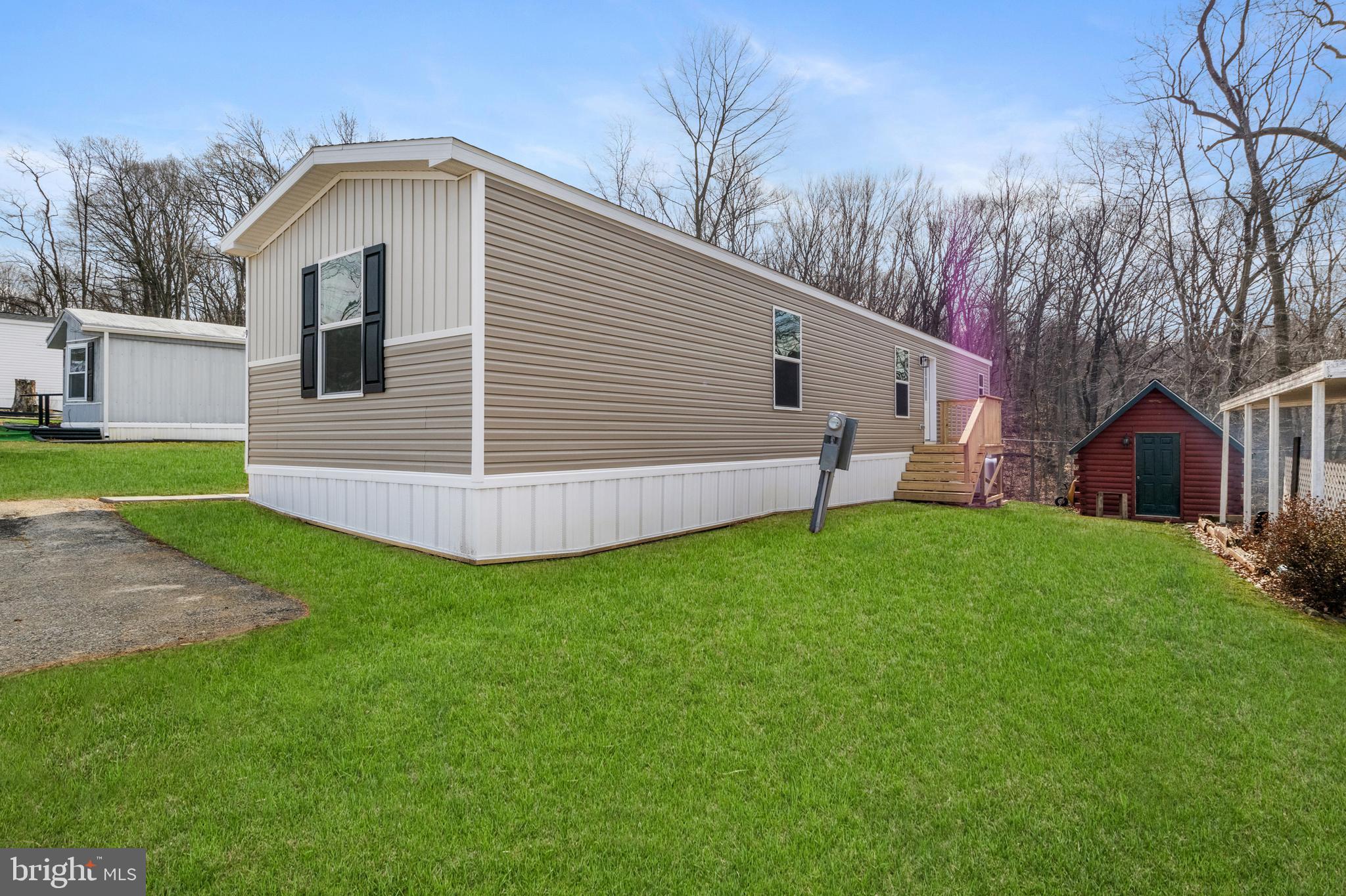 9 Mill Street York, PA 17406 - Photo 21 of 32 a front view of a house with garden