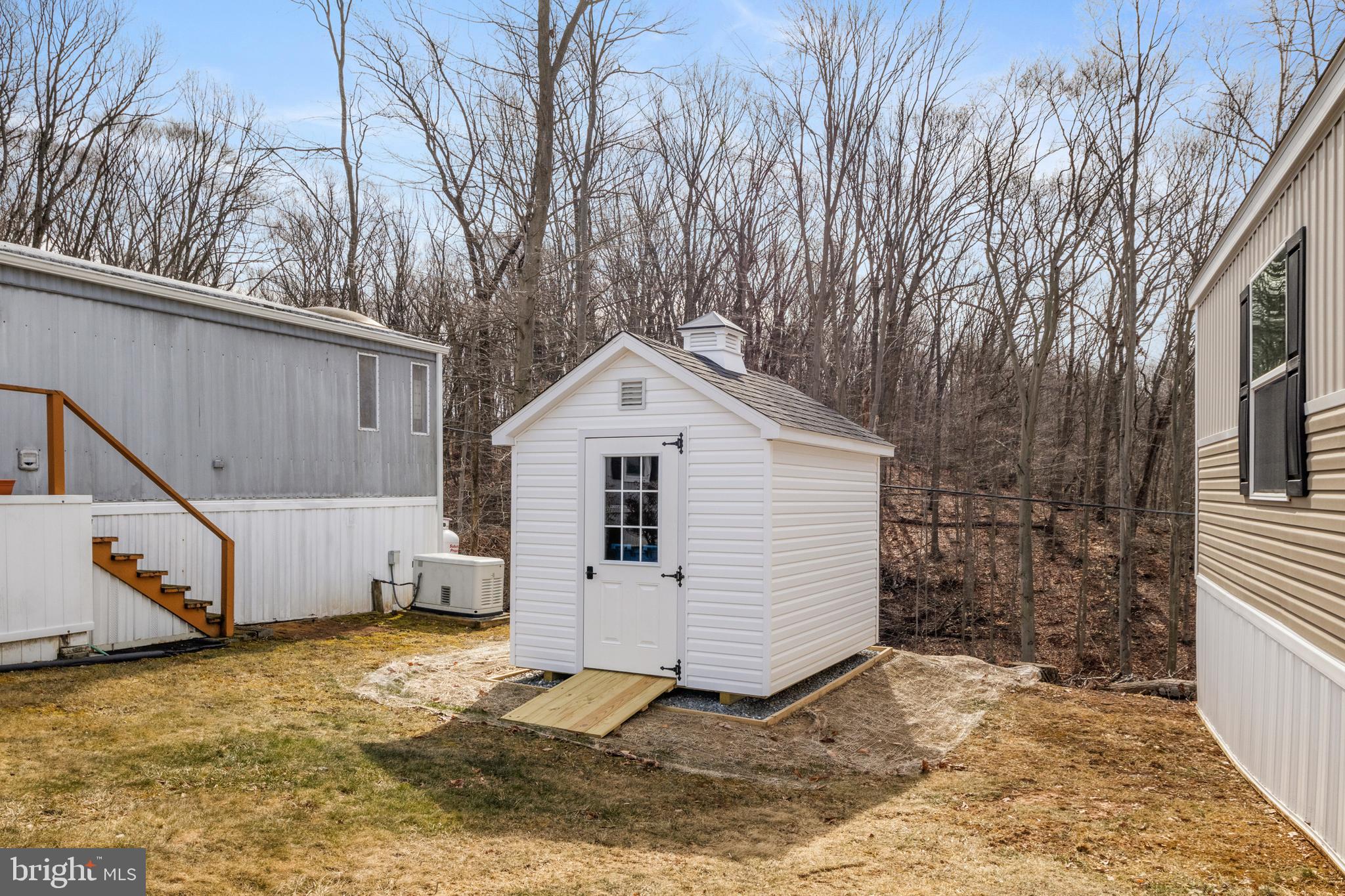 9 Mill Street York, PA 17406 - Photo 25 of 32 a view of a house with a yard covered in snow