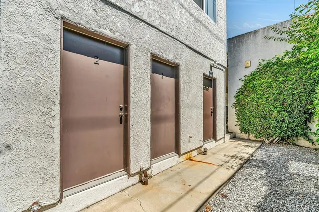 front view of a house with a tub