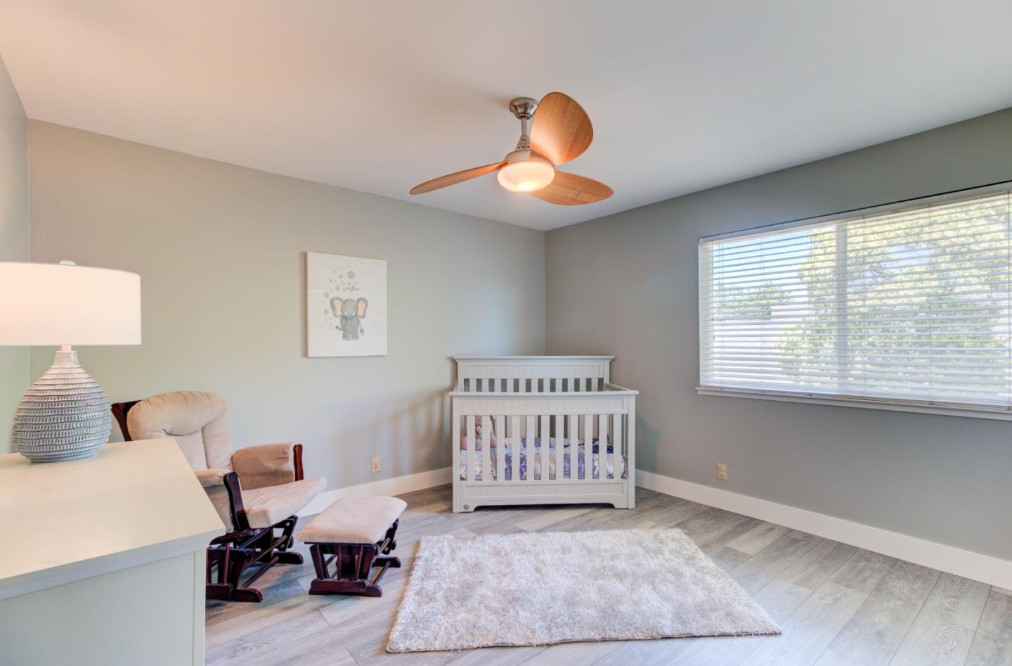 15120 Venetian Way Morgan Hill, CA 95037 - Photo 30 of 39 a bedroom with furniture and a window