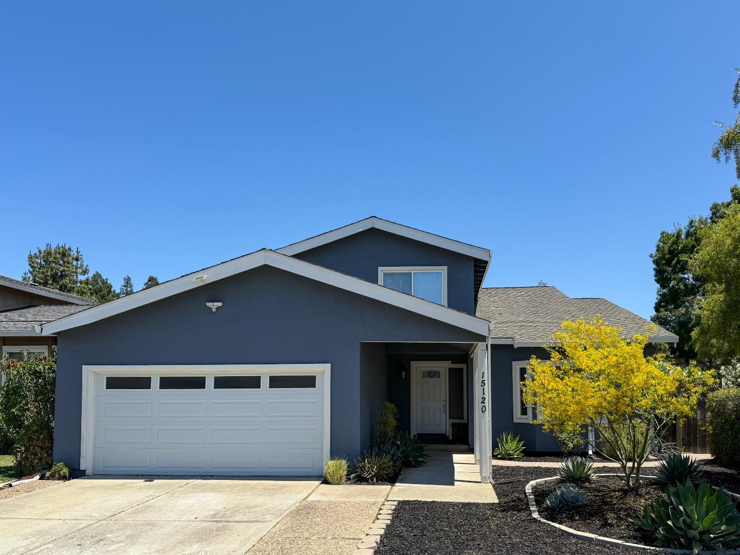 15120 Venetian Way Morgan Hill, CA 95037 - Photo 3 of 39 a front view of a house with a yard