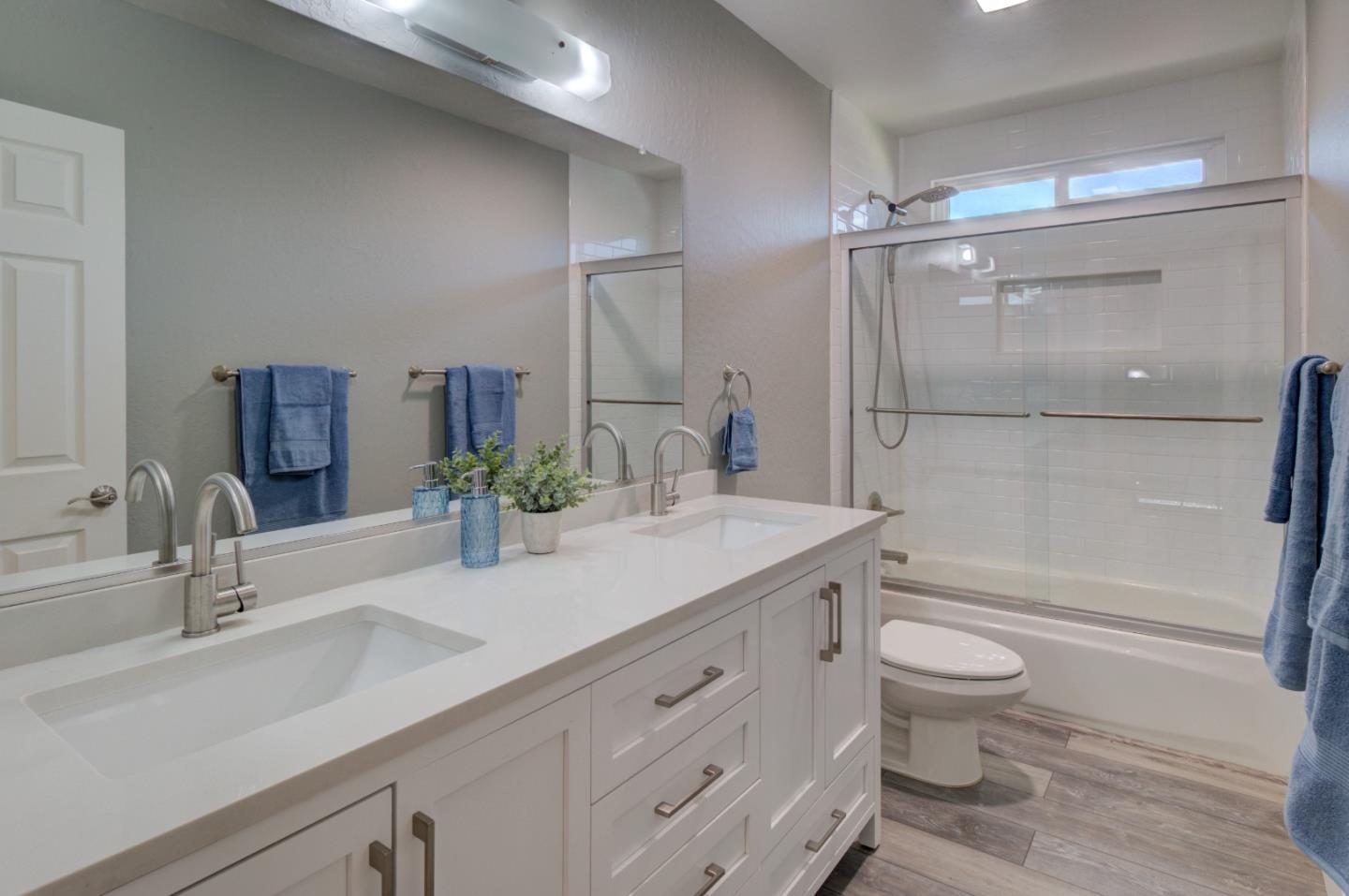 15120 Venetian Way Morgan Hill, CA 95037 - Photo 31 of 39 a bathroom with a sink a toilet and shower