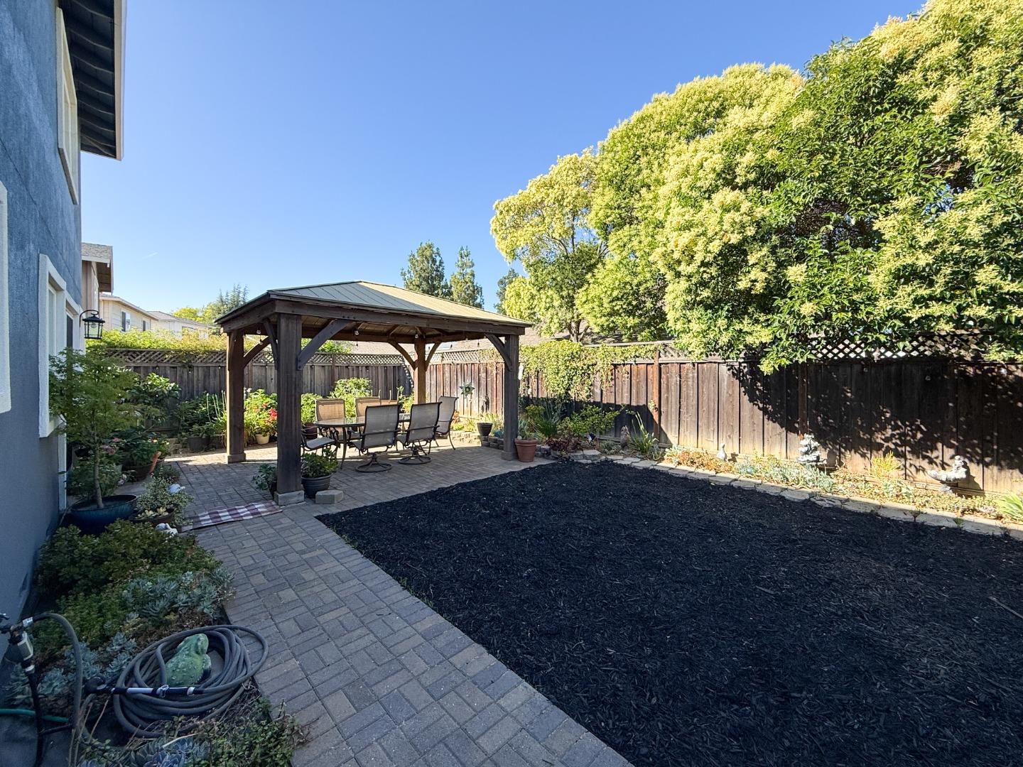 15120 Venetian Way Morgan Hill, CA 95037 - Photo 39 of 39 a view of a yard with an outdoor space