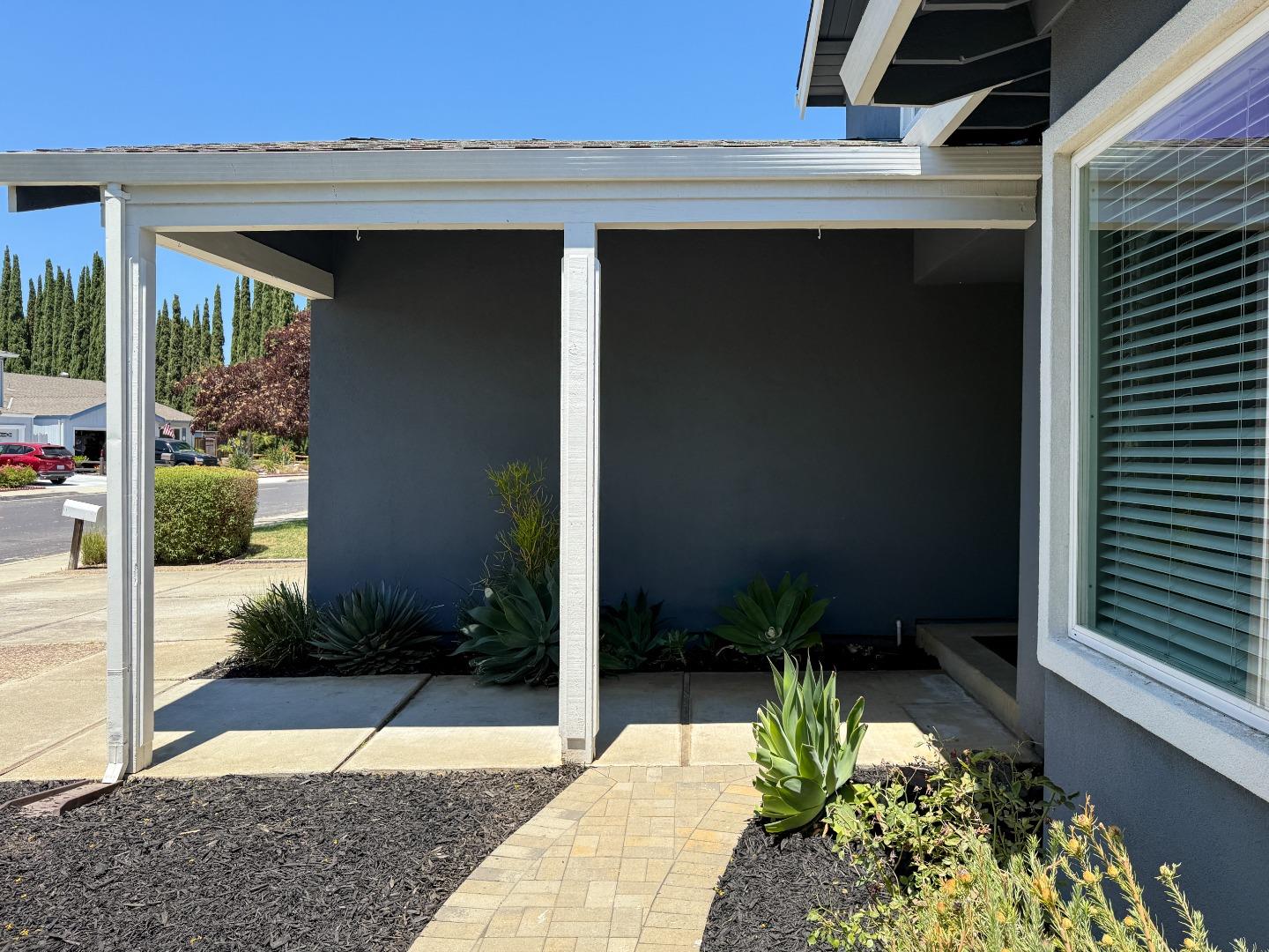 15120 Venetian Way Morgan Hill, CA 95037 - Photo 5 of 39 a view of potted plant in front of a door