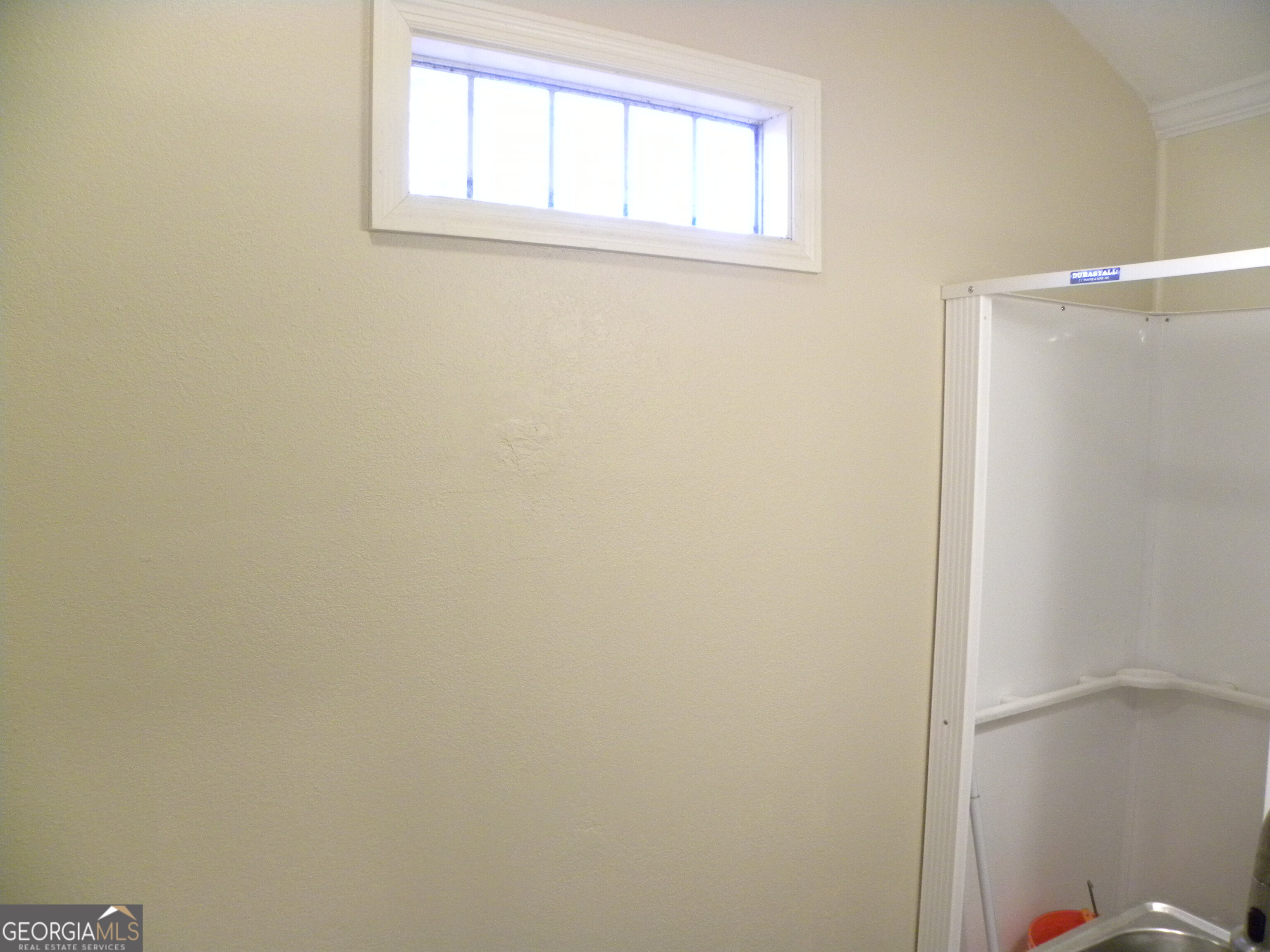 105 West Z Clayton, GA 30562 - Photo 11 of 20 a bathroom with a window
