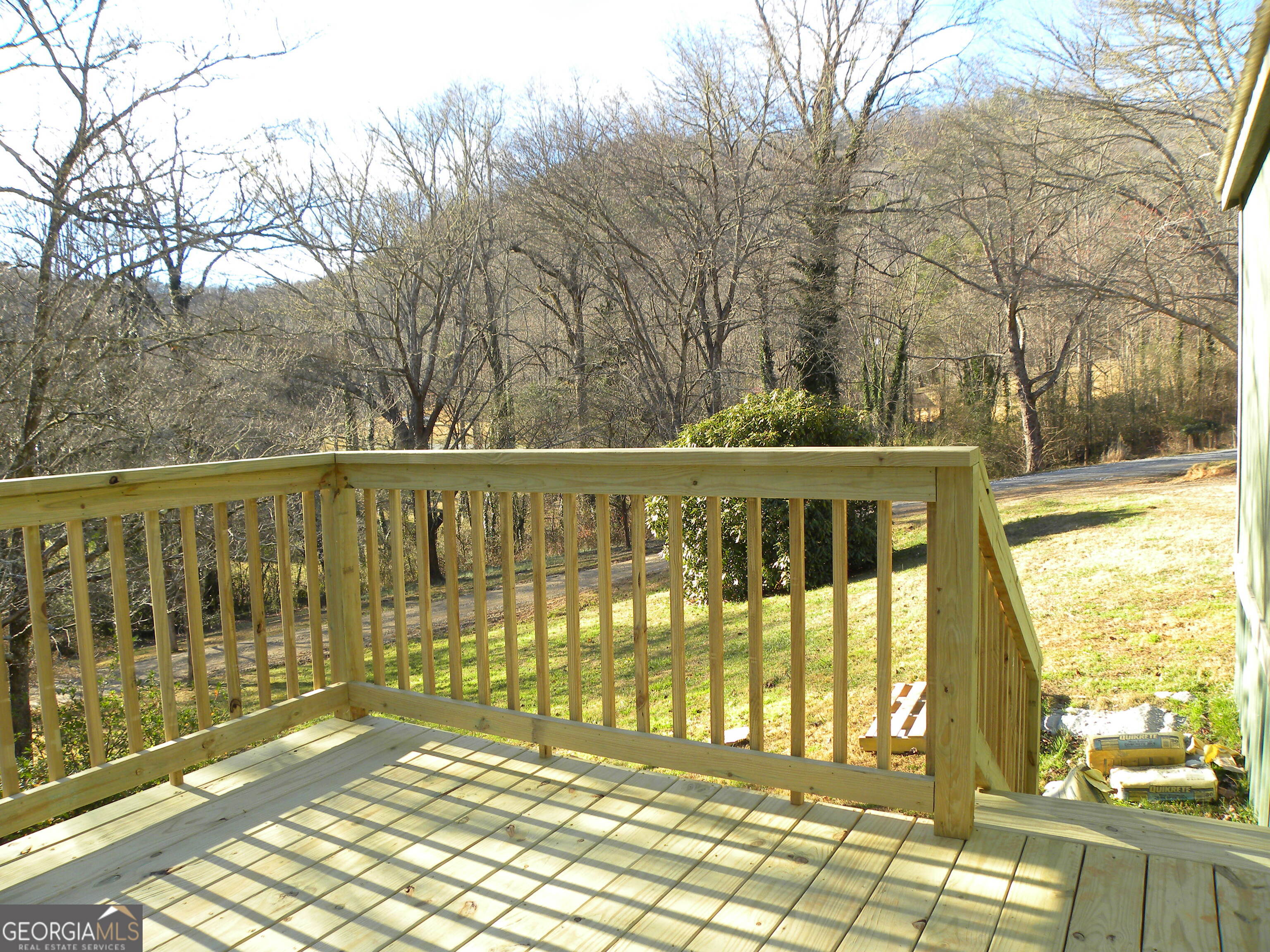 105 West Z Clayton, GA 30562 - Photo 14 of 20 a view of a street with wooden fence