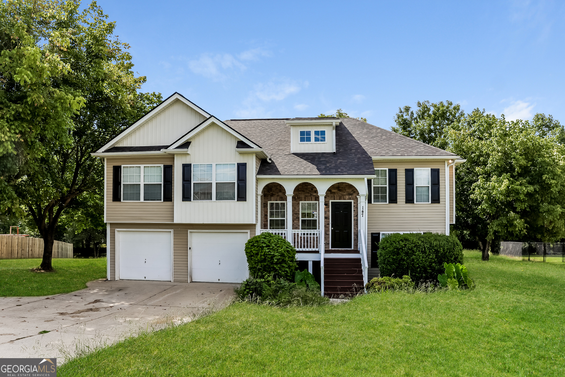 147 Portland Road Aragon, GA 30104 - Photo 1 of 17 a front view of a house with a yard