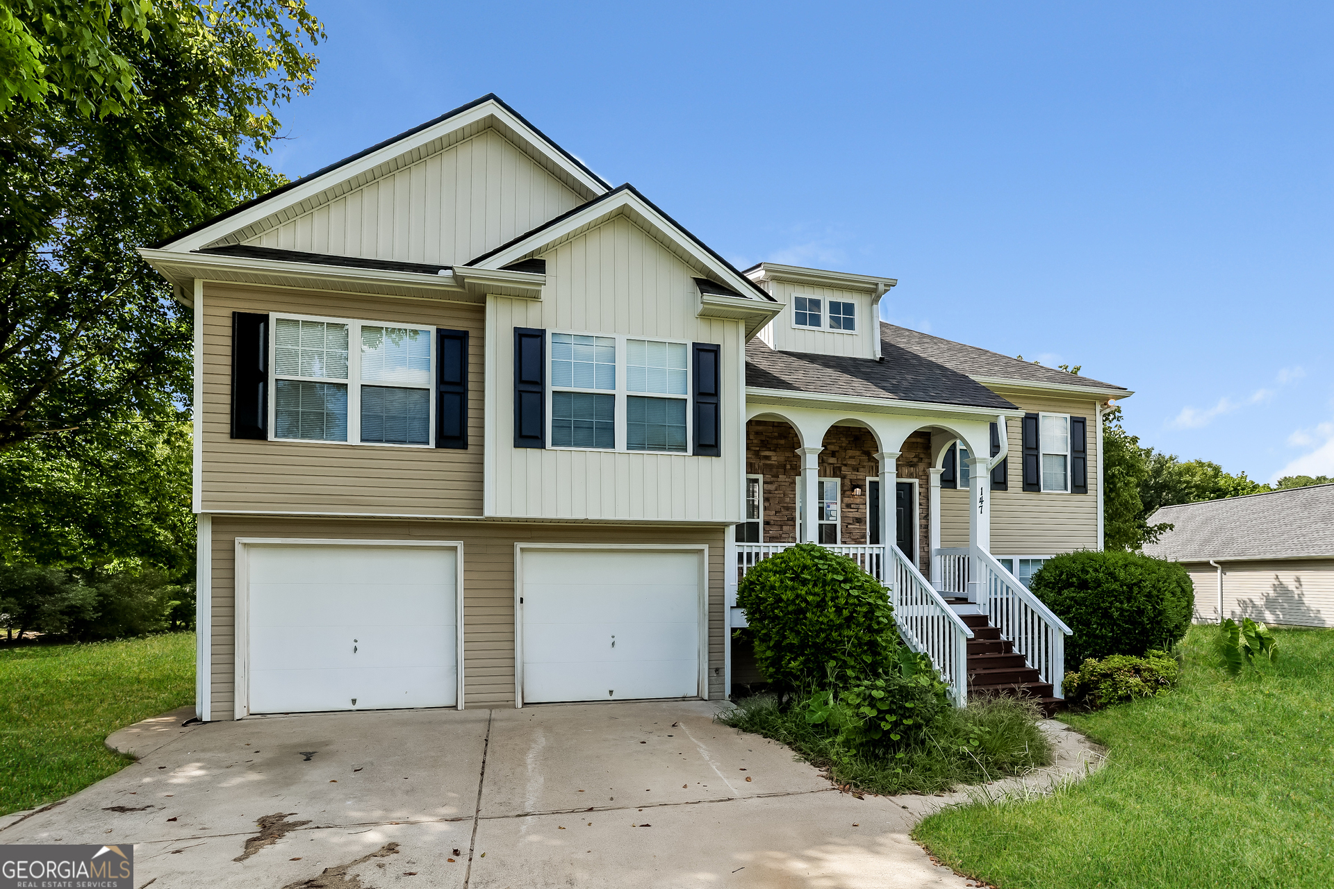147 Portland Road Aragon, GA 30104 - Photo 2 of 17 a front view of a house with a garden