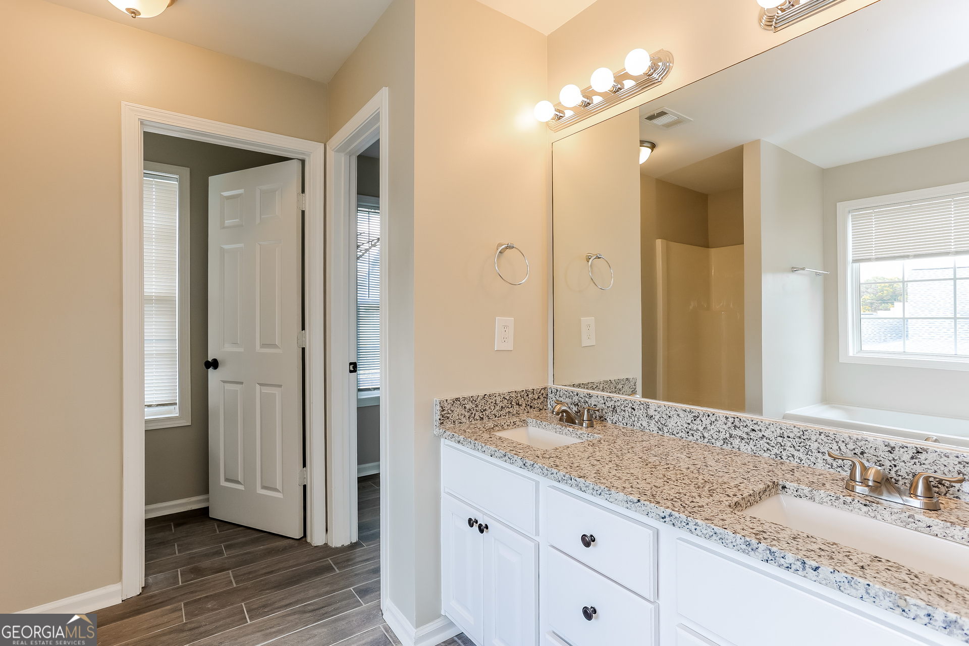 147 Portland Road Aragon, GA 30104 - Photo 10 of 17 a bathroom with a granite countertop sink and a mirror
