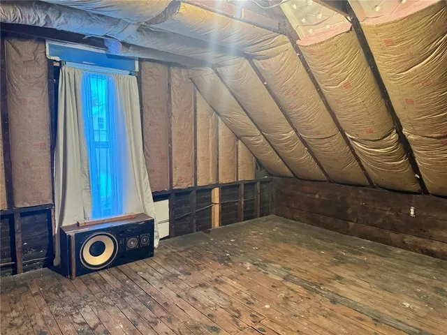 a view of house with outdoor seating