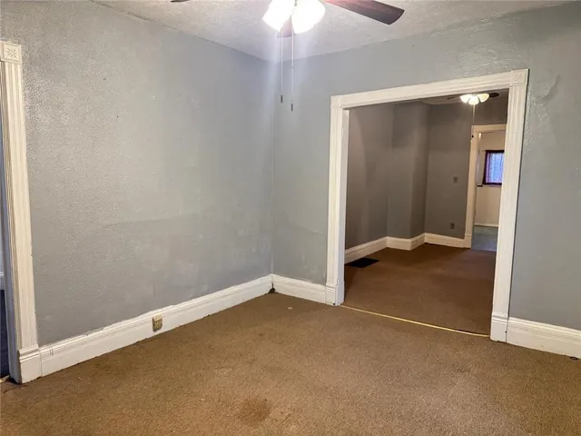 an empty room with an entryway