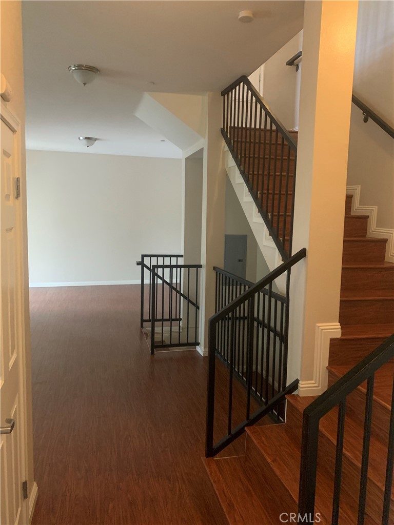 920 Central Avenue, Unit 101 Riverside, CA 92507 - Photo 7 of 23 a view of entryway with wooden floor