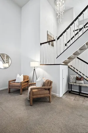 a view of livingroom with furniture and stairs
