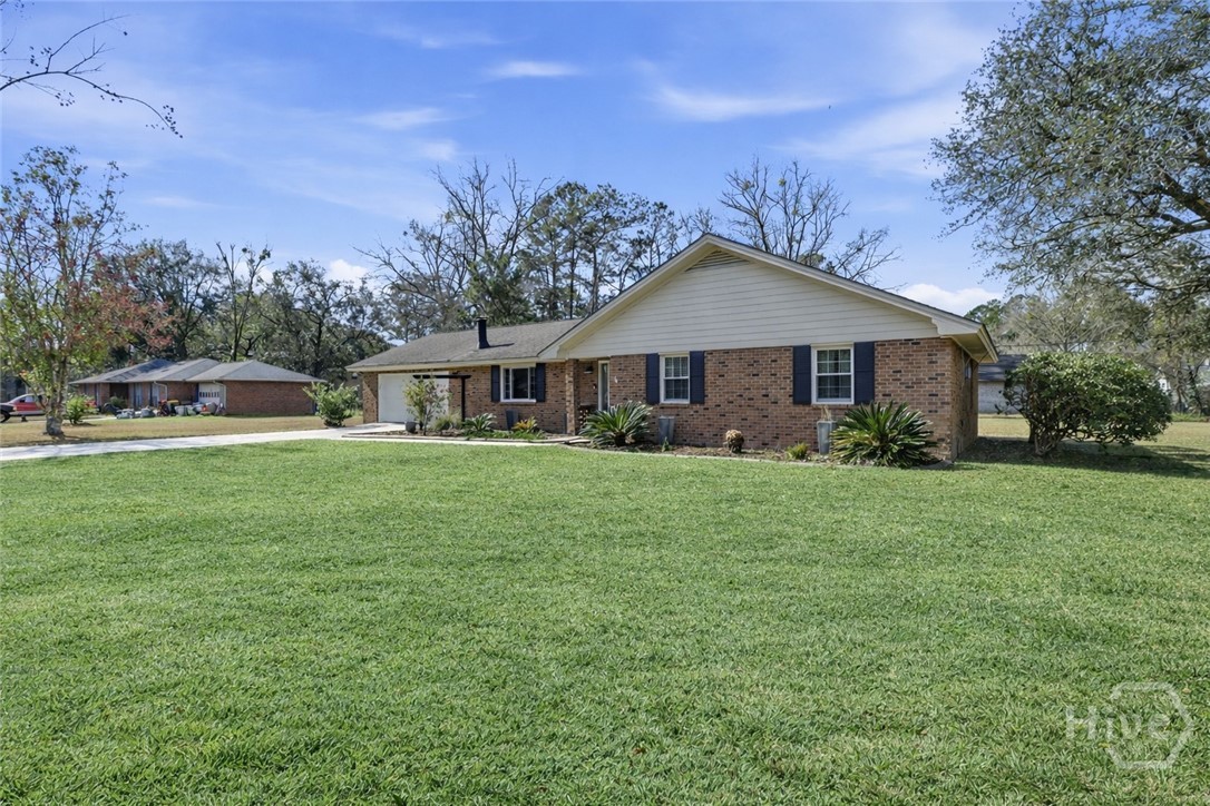 73 Bea Road Richmond Hill, GA 31324 - Photo 25 of 34 Grass has been enhanced.