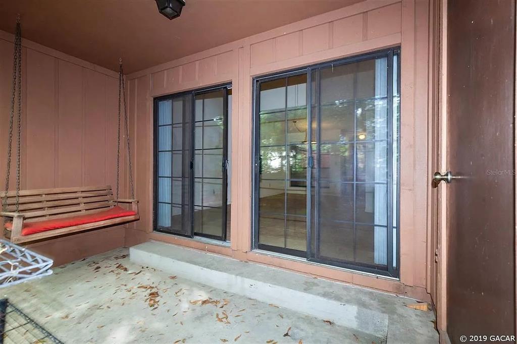 960 Southwest 55th Terrace Gainesville, FL 32607 - Photo 2 of 8 a view of front door of a house