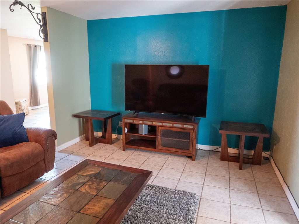 372 East Fm 771 Riviera, TX 78379 - Photo 19 of 40 a living room with furniture and a flat screen tv