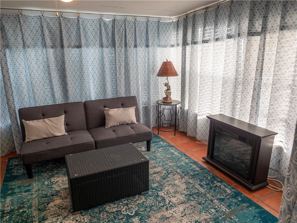 372 East Fm 771 Riviera, TX 78379 - Photo 21 of 40 a living room with furniture and a fireplace